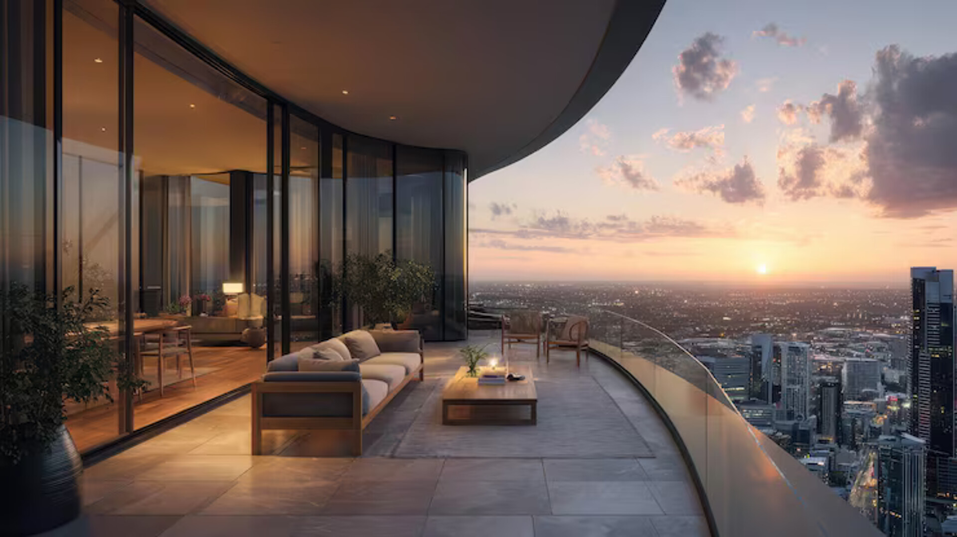 Luxury penthouse with panoramic city view at golden hour